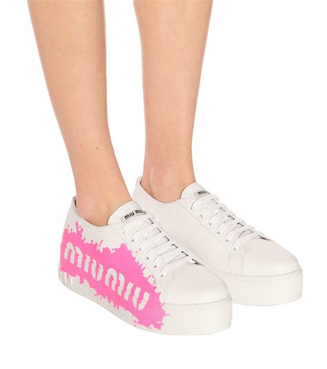 miumiu sneakers.